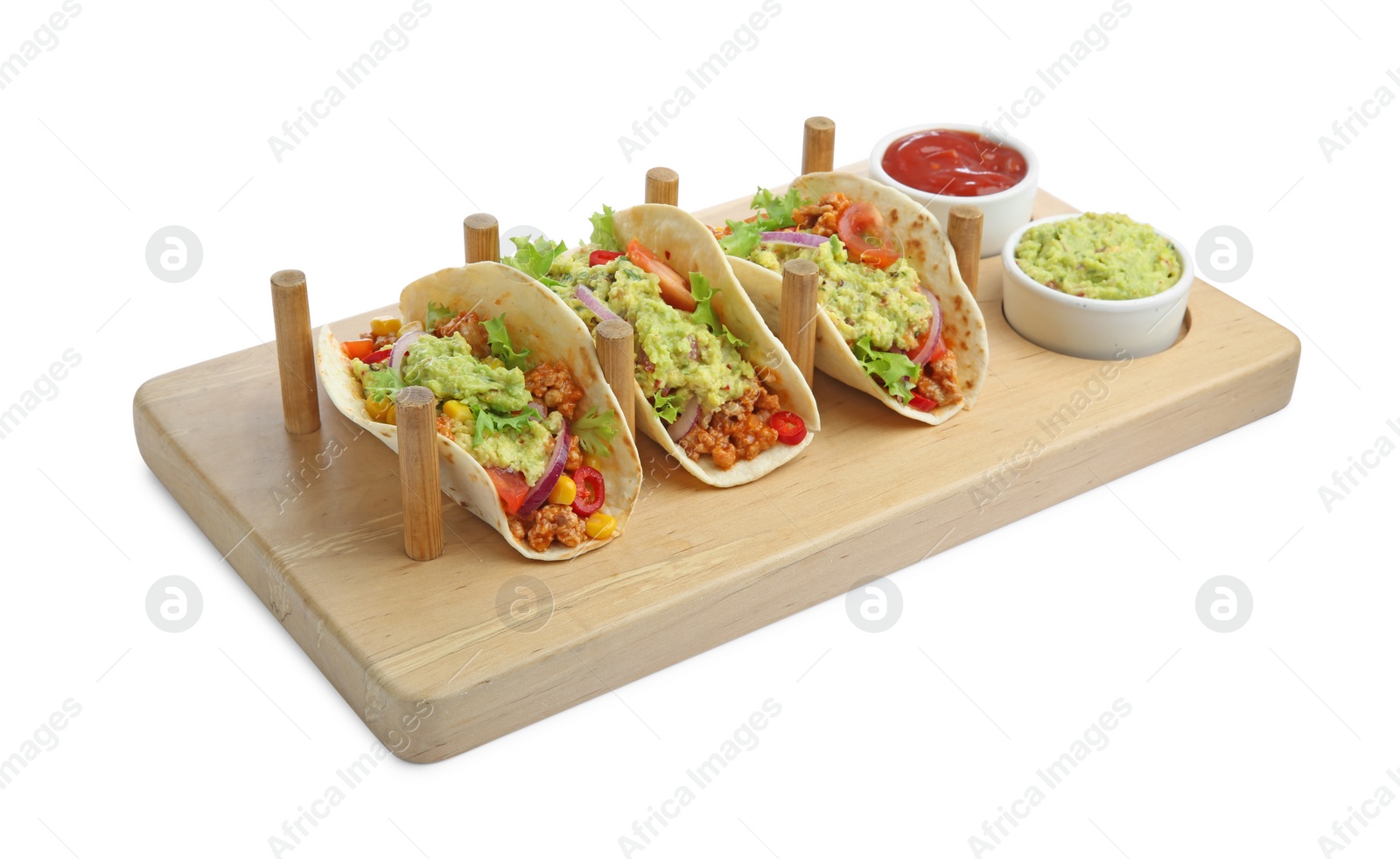 Photo of Delicious tacos with guacamole and vegetables isolated on white