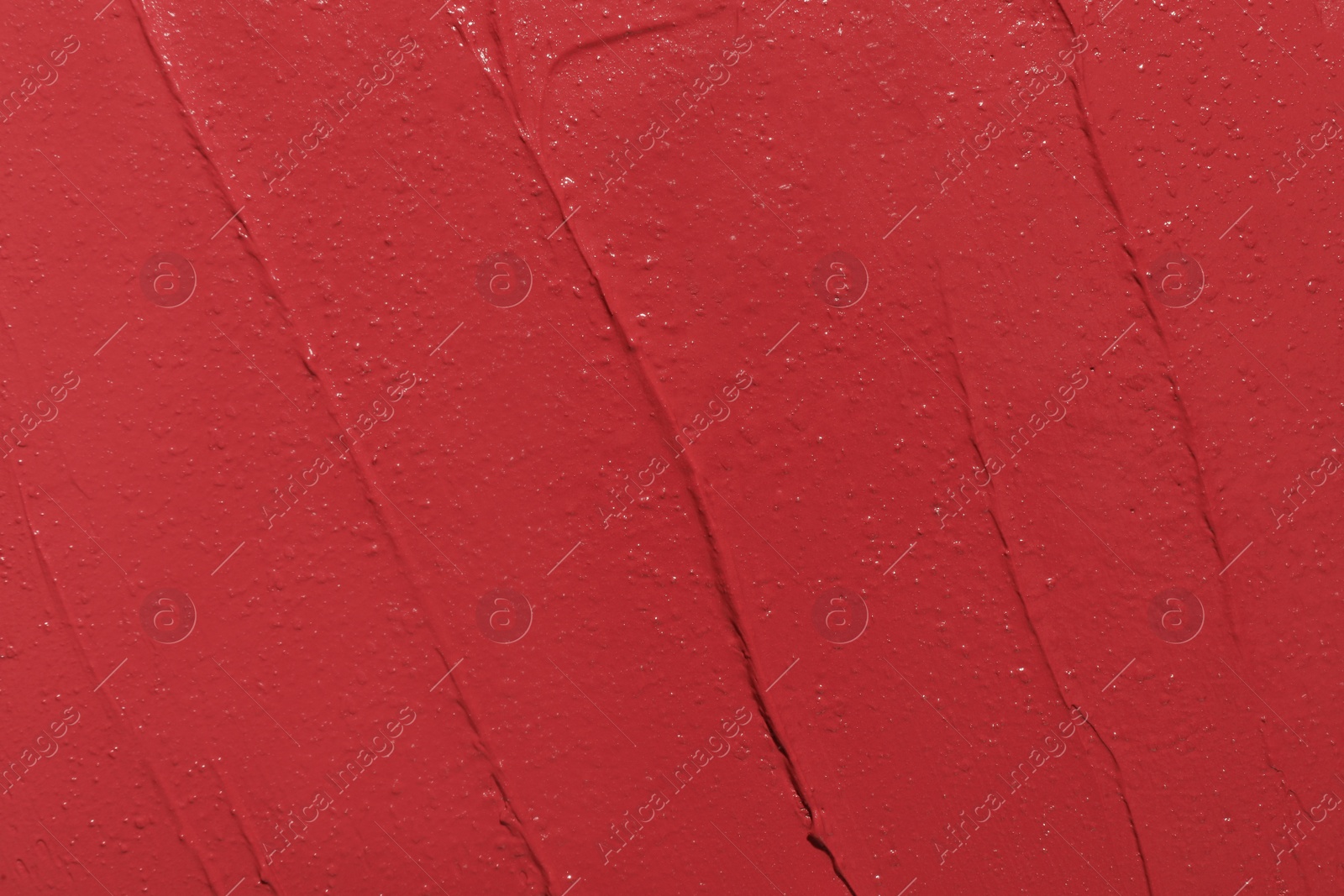 Photo of Texture of lipstick as background, top view