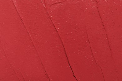 Photo of Texture of lipstick as background, top view