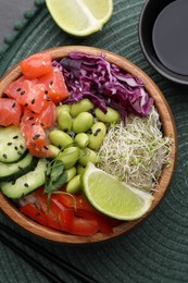 Photo of Delicious poke bowl with vegetables, fish and edamame beans on table, flat lay