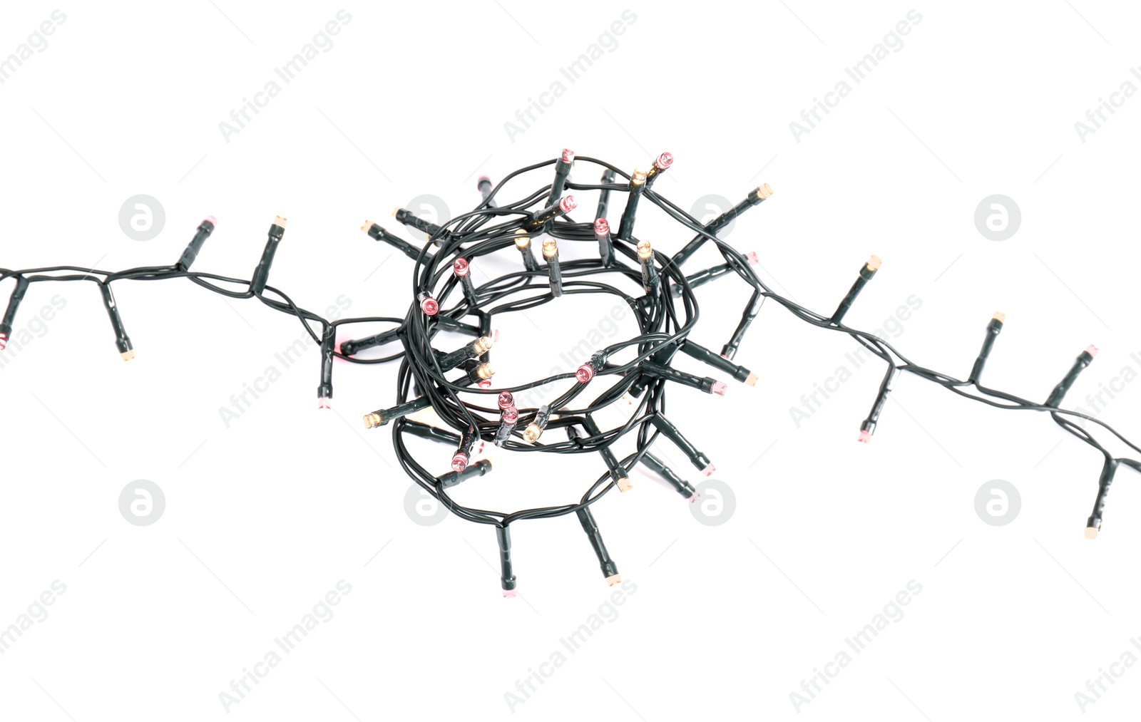 Photo of Beautiful Christmas lights on white background, top view