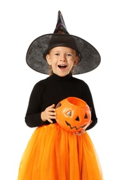 Photo of Cute little girl with pumpkin candy bucket wearing Halloween costume on white background