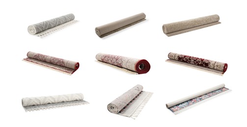 Many different rolled carpets isolated on white, set