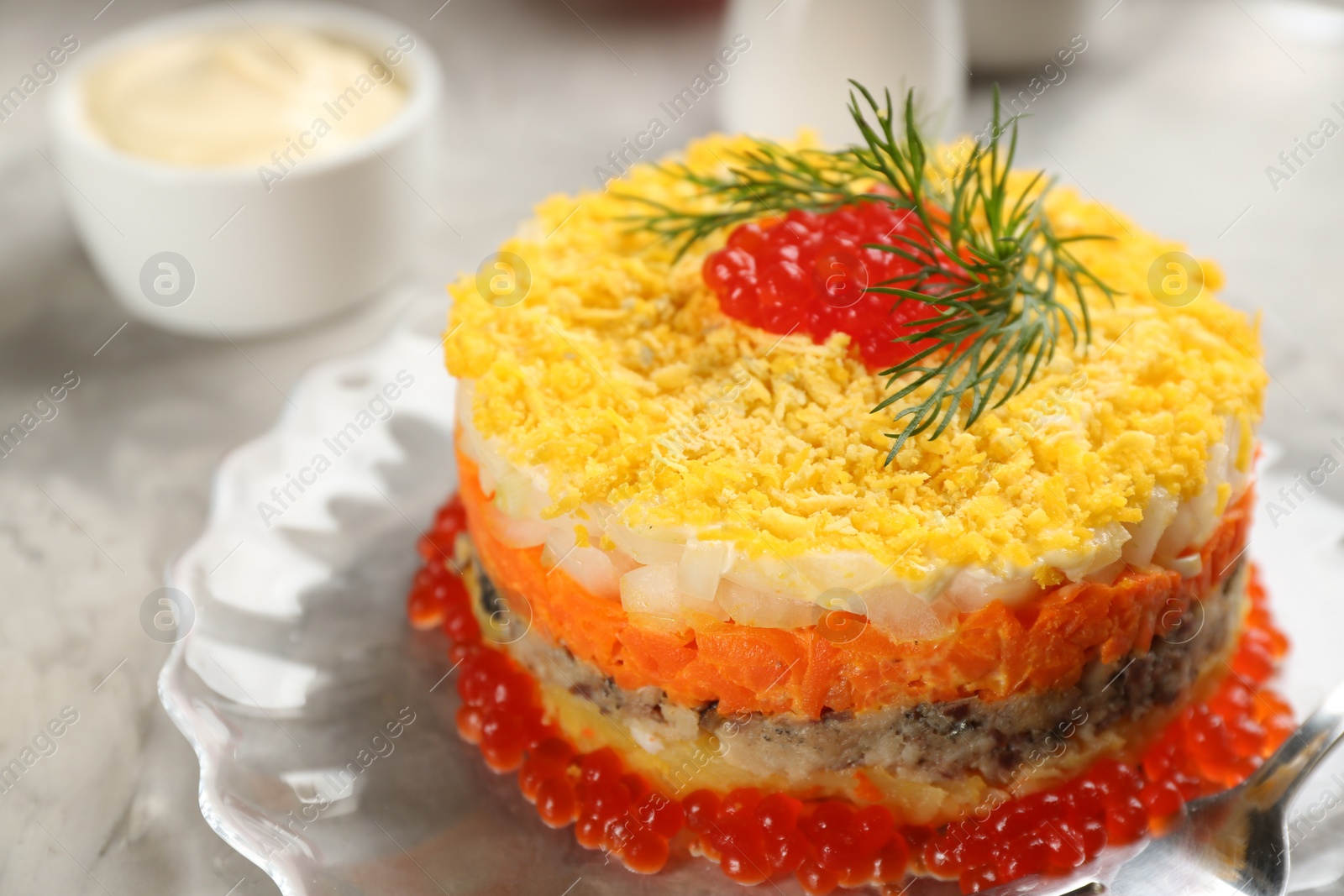 Photo of Traditional russian salad Mimosa on table, closeup