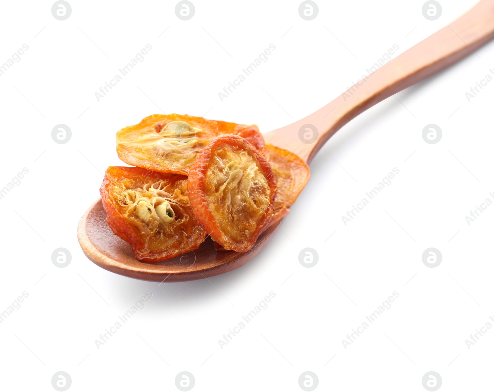 Photo of Wooden spoon with cut dried kumquat fruits isolated on white
