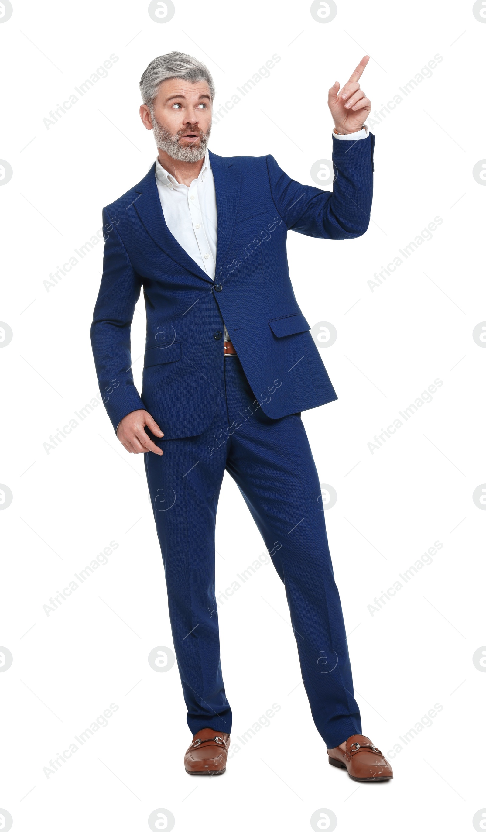 Photo of Mature businessman in stylish clothes posing on white background