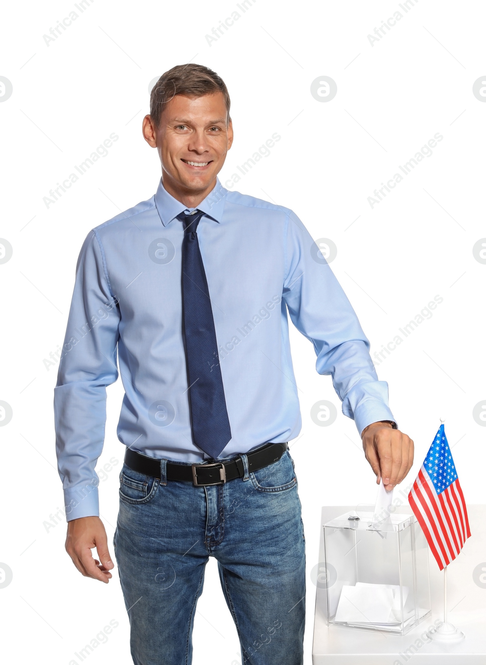 Photo of Man putting ballot paper into box against white background