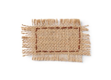Photo of Piece of burlap fabric with brown stitches isolated on white, top view