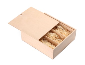 Photo of Open wooden wine box with straw isolated on white