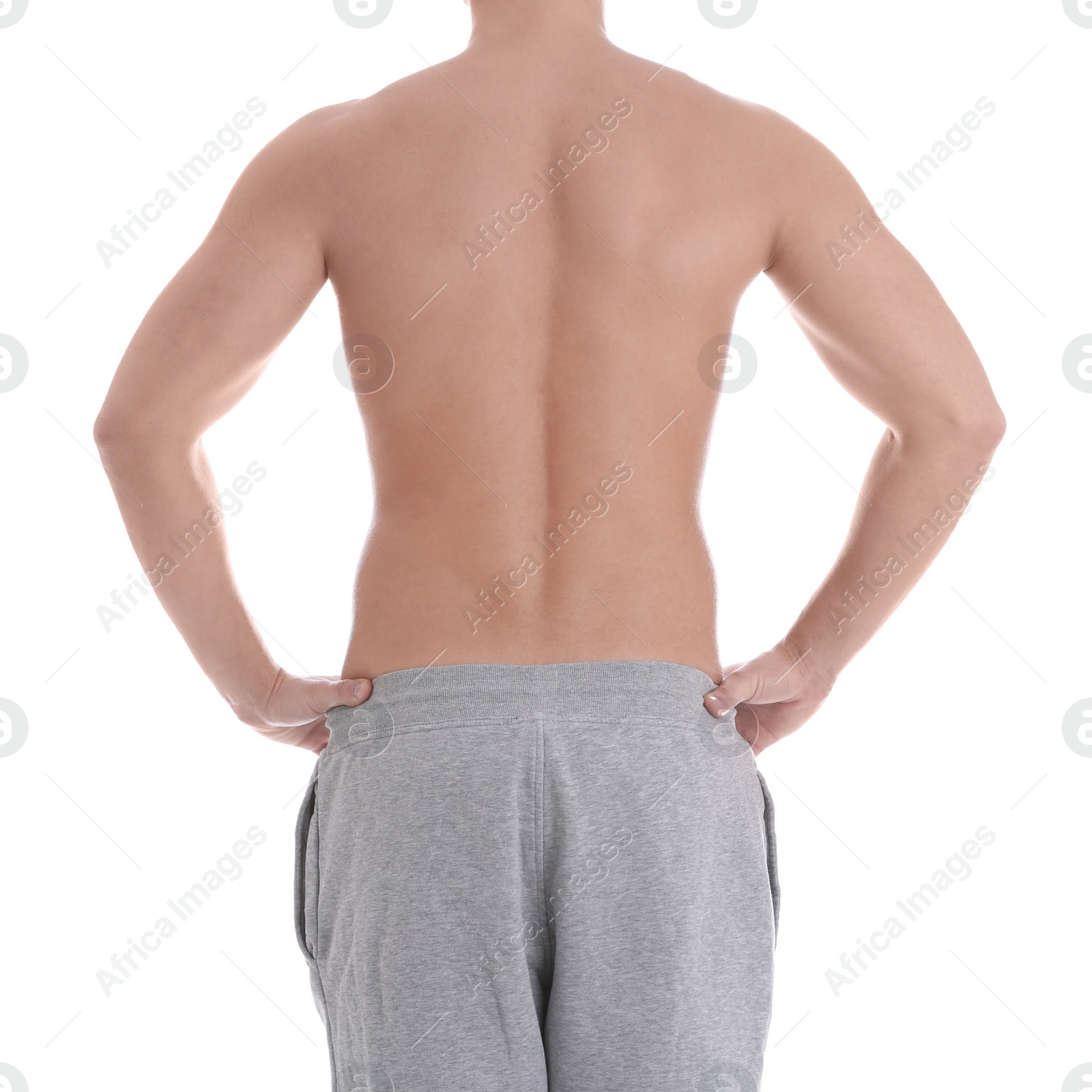 Photo of Young athletic man on white background, closeup. Weight loss