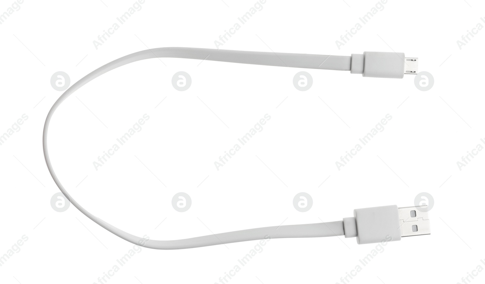 Photo of USB charge cable isolated on white, top view. Modern technology