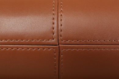 Photo of Texture of brown leather as background, top view