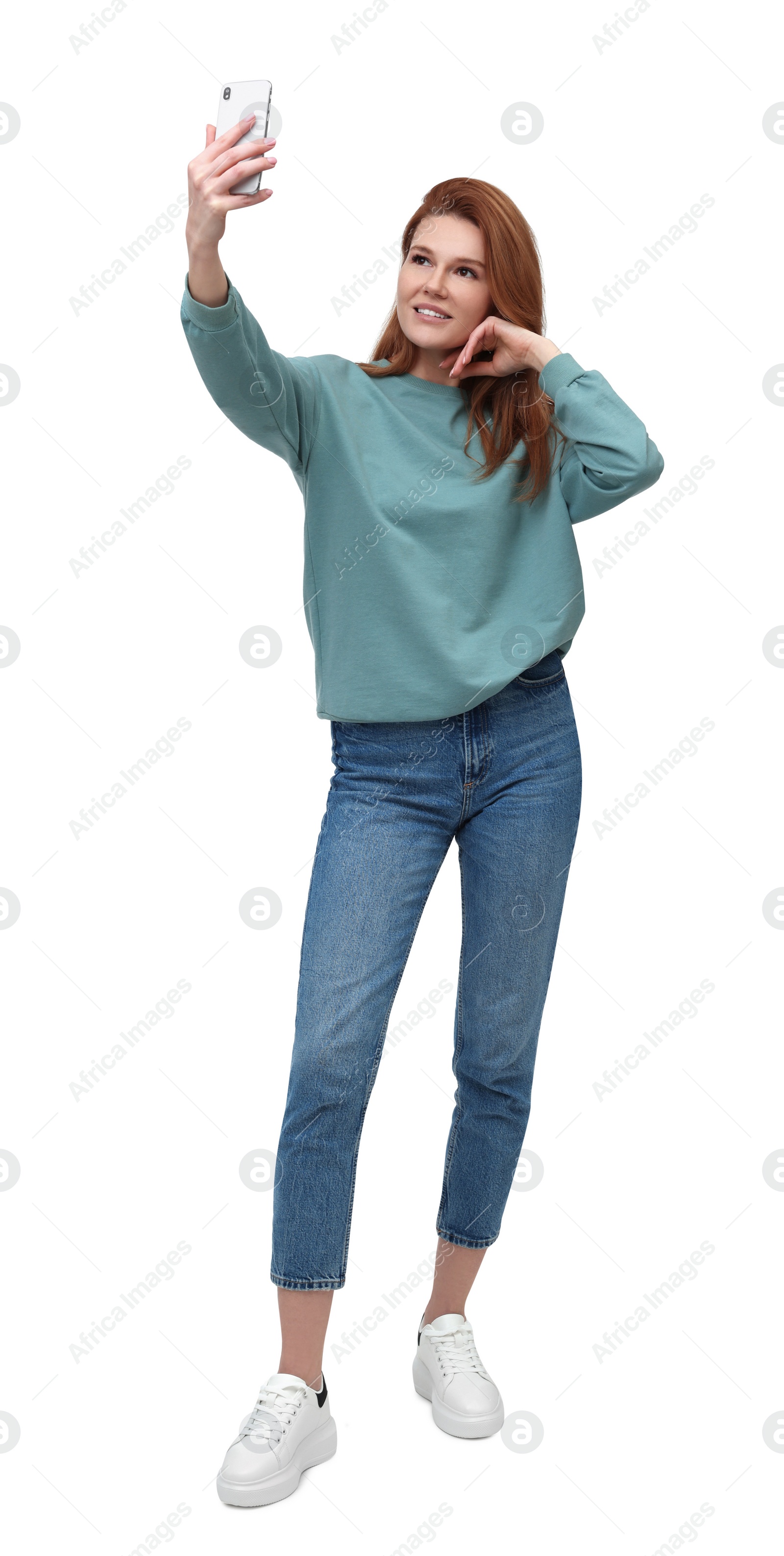 Photo of Beautiful woman taking selfie on white background