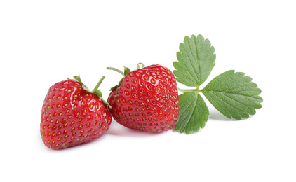 Sweet fresh ripe strawberries with green leaves on white background