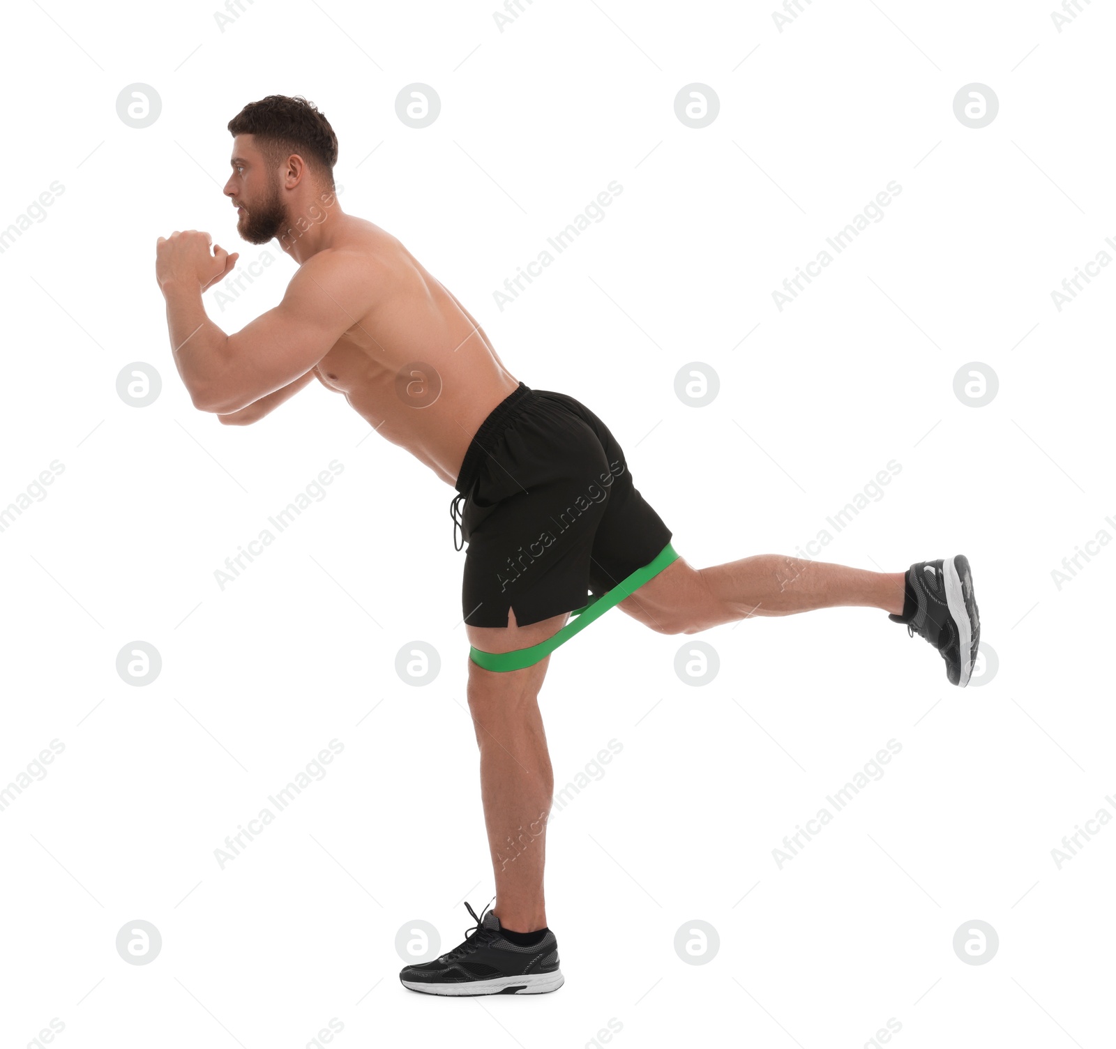 Photo of Young man exercising with elastic resistance band on white background