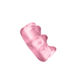 Photo of Delicious pink jelly bear on white background