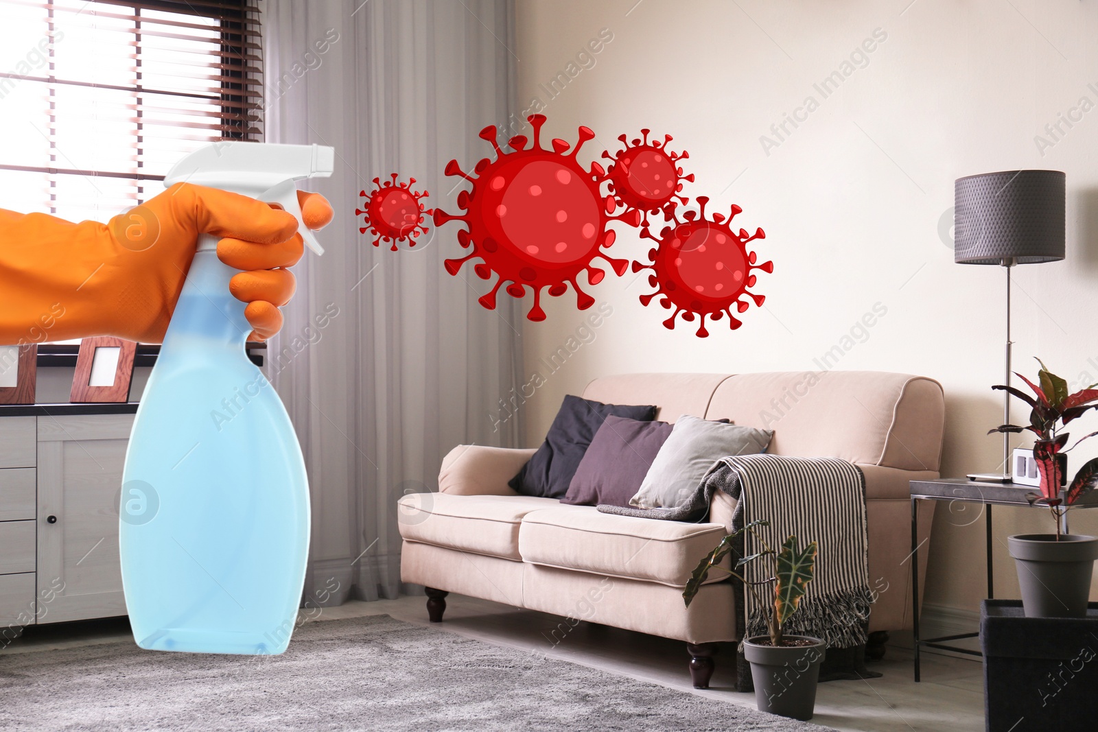 Image of Keep your home virus-free. Woman cleaning room with disinfecting solution 