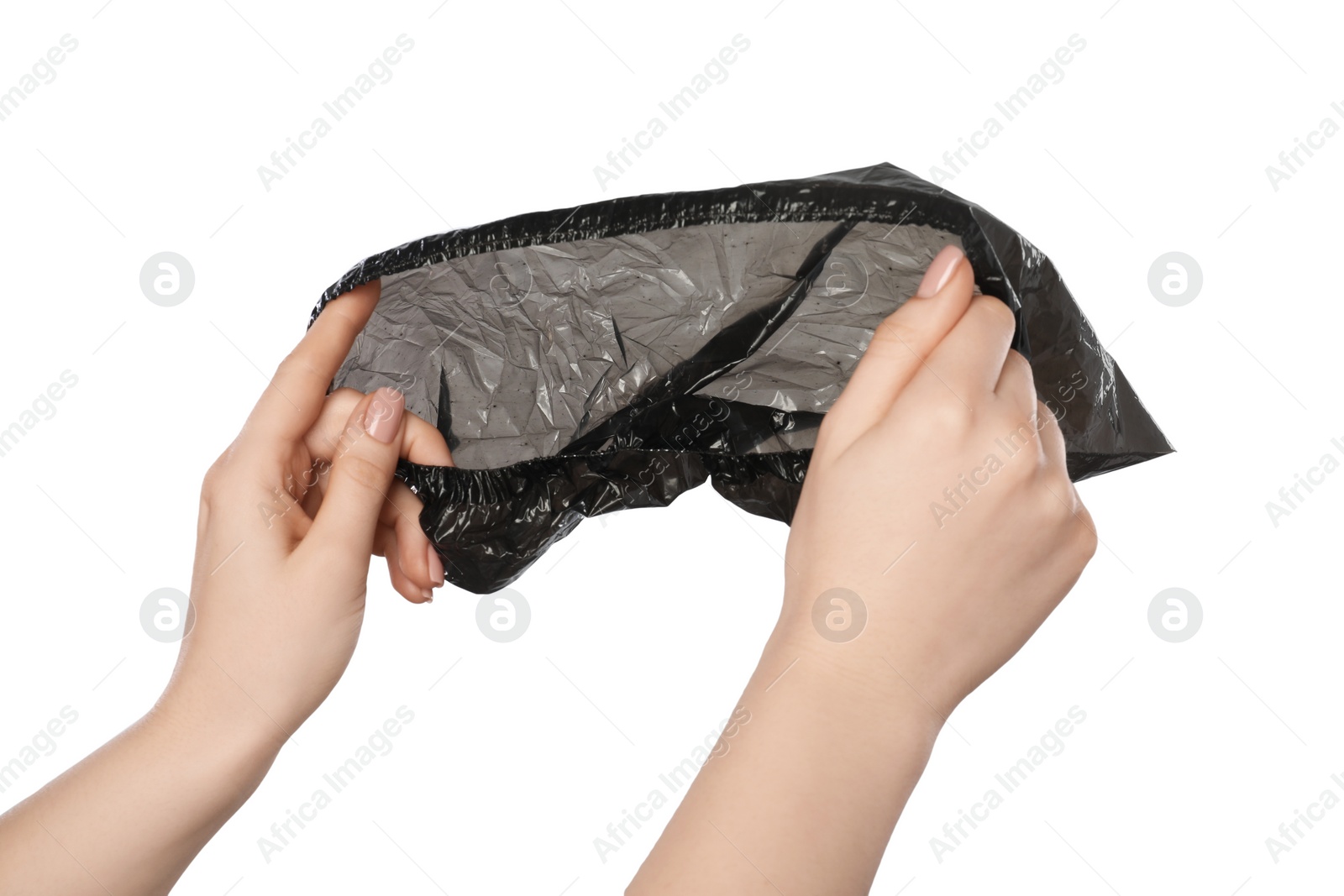 Photo of Woman holding black shoe cover on white background, closeup