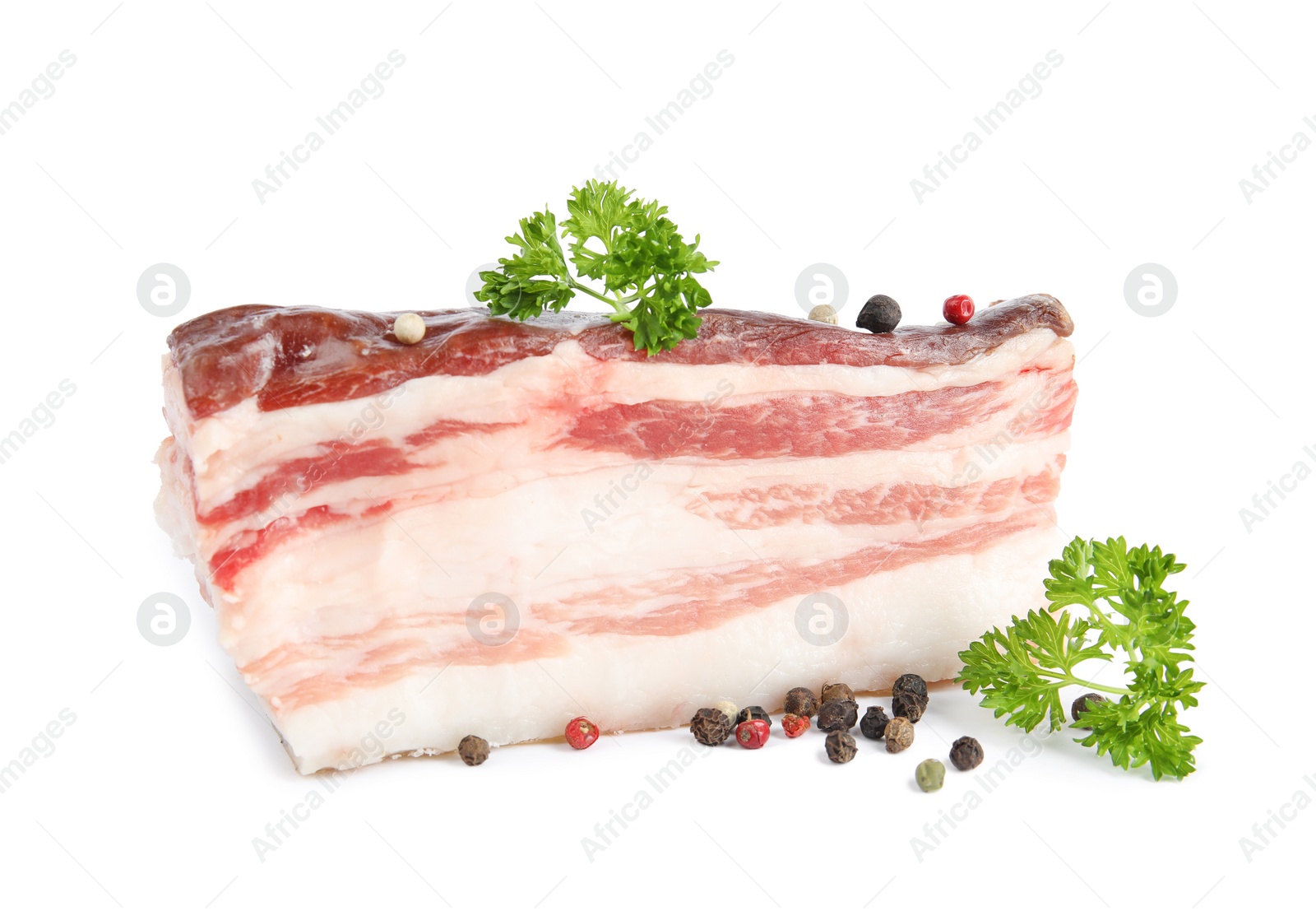 Photo of Piece of bacon with peppercorn and parsley isolated on white