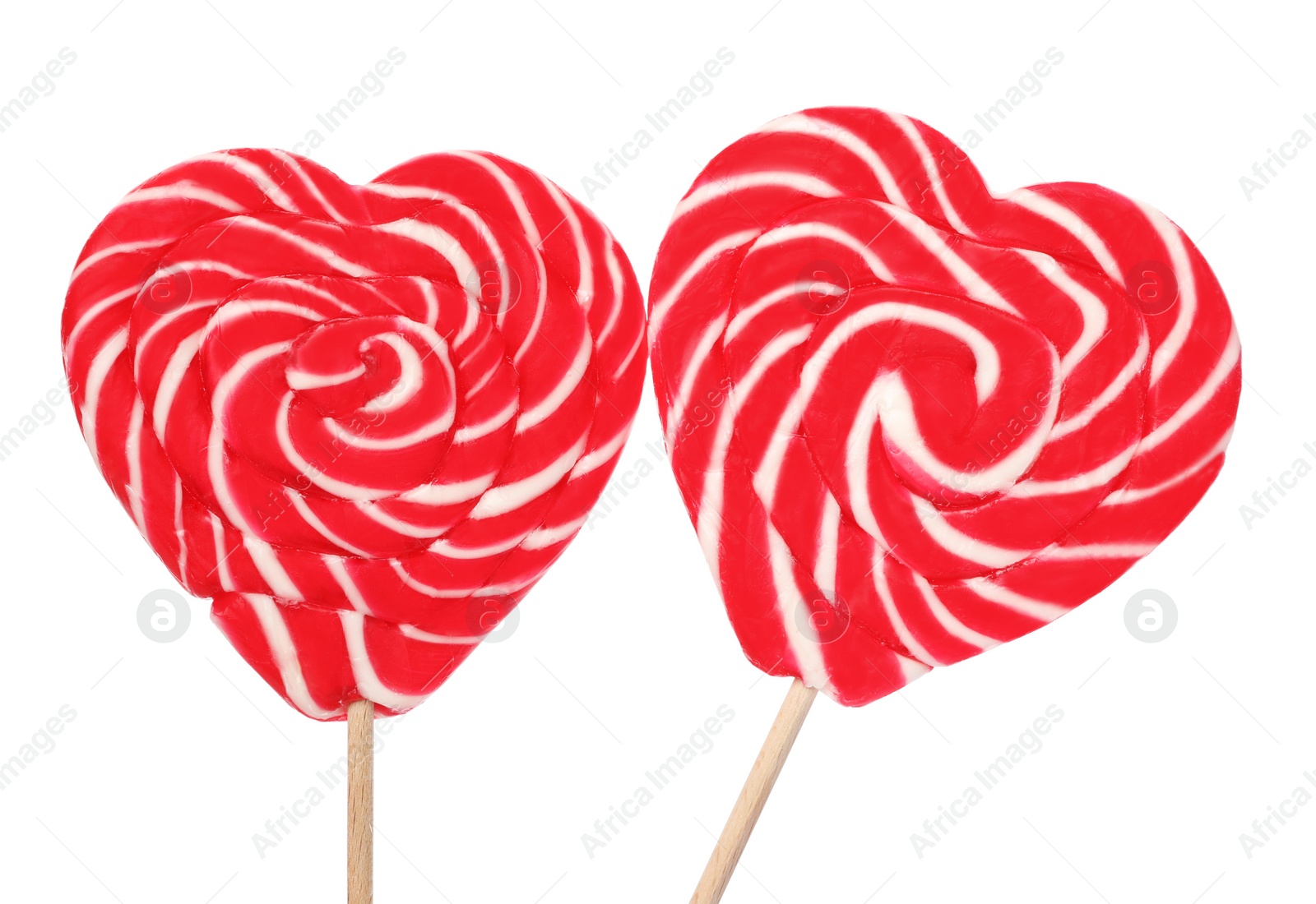 Photo of Sweet heart shaped lollipops on white background. Valentine's day celebration