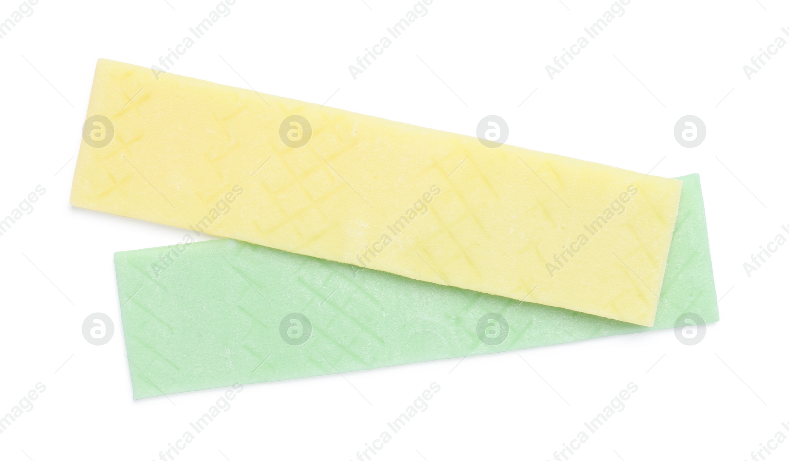 Photo of Sticks of tasty bubble gums isolated on white, top view