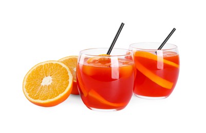 Photo of Aperol spritz cocktail, straws and orange slices in glasses isolated on white