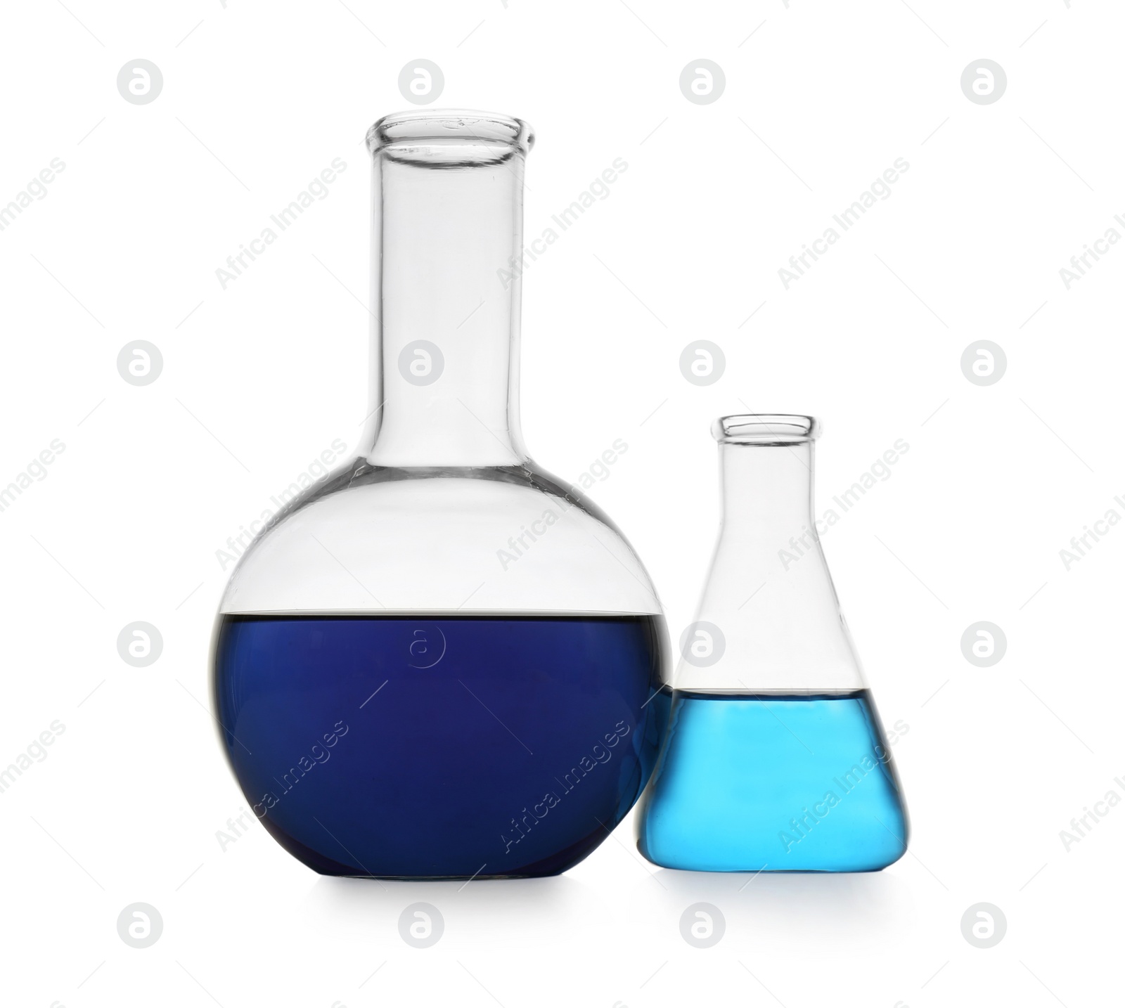 Photo of Chemistry glassware with color samples isolated on white