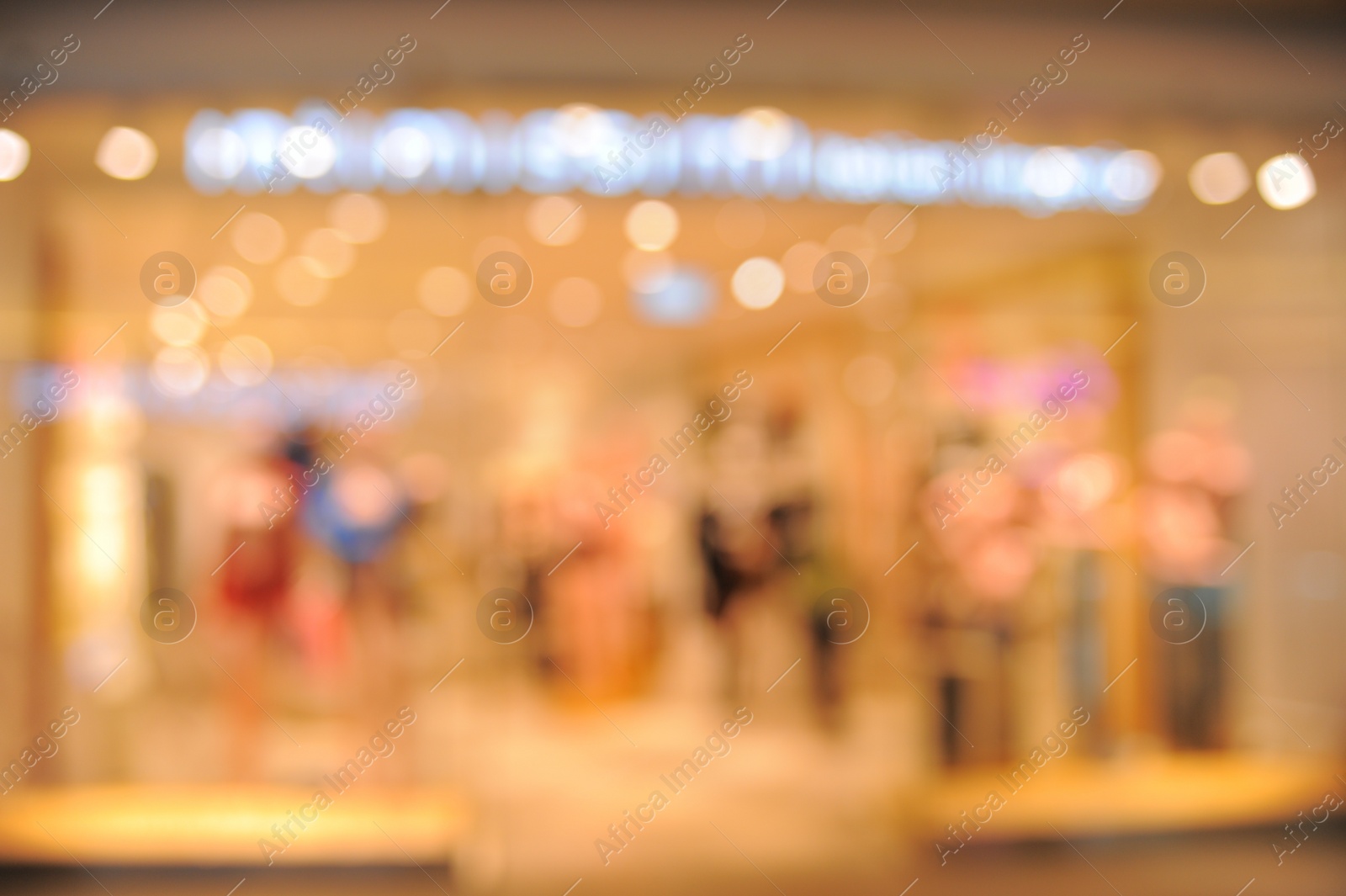 Photo of Blurred view of shopping mall interior. Bokeh effect