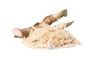 Grated and cut horseradish root isolated on white