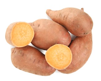 Photo of Whole and cut sweet potatoes on white background, top view