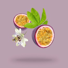 Image of Tasty passion fruit, passiflora leaf and flower falling on pink background