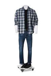 Photo of Male mannequin with shoes dressed in stylish shirt and jeans isolated on white