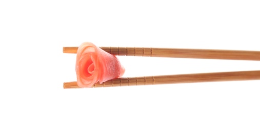 Chopsticks with pickled ginger on white background