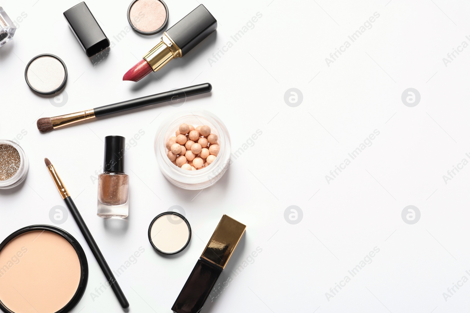 Photo of Different luxury makeup products on white background, top view