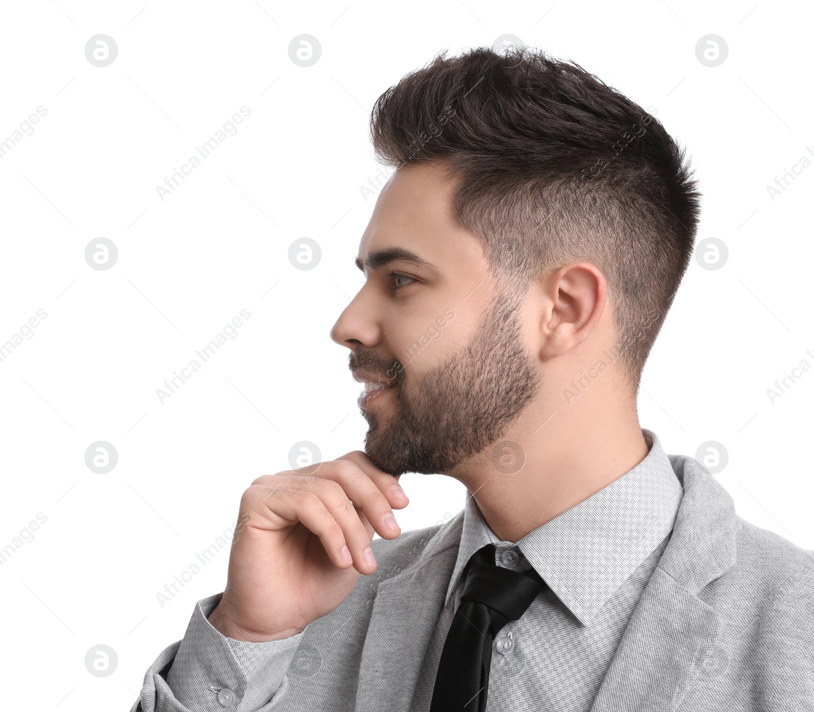 Photo of Young businessman in suit on white background