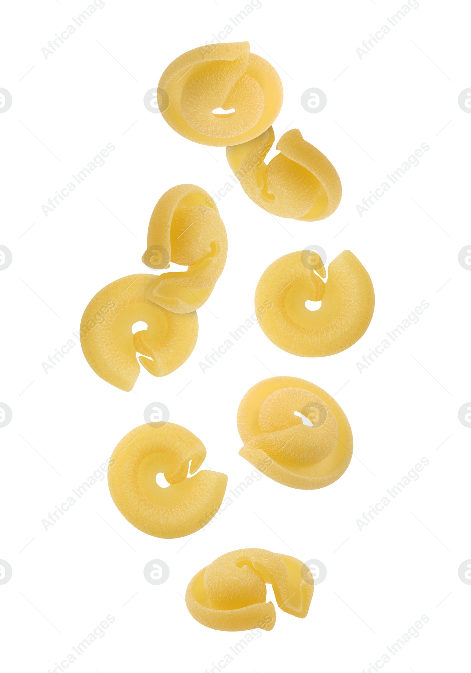 Image of Raw dischi volanti pasta flying on white background