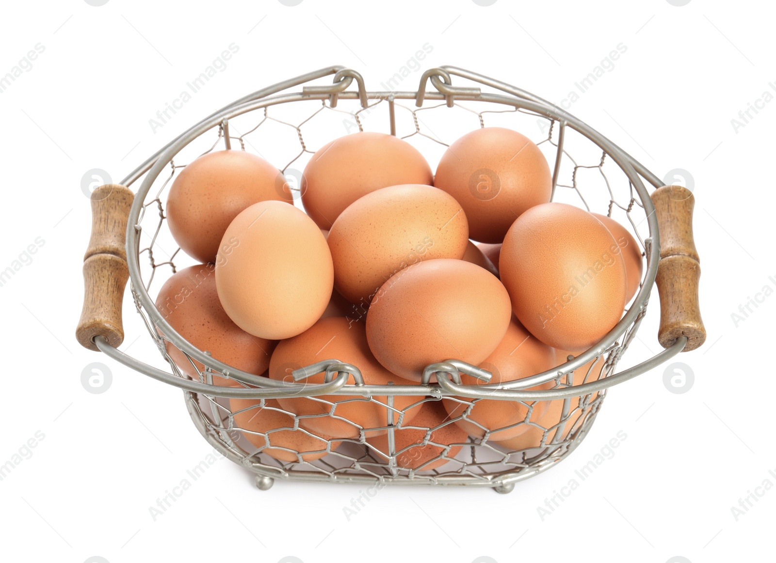 Photo of Chicken eggs in metal basket isolated on white