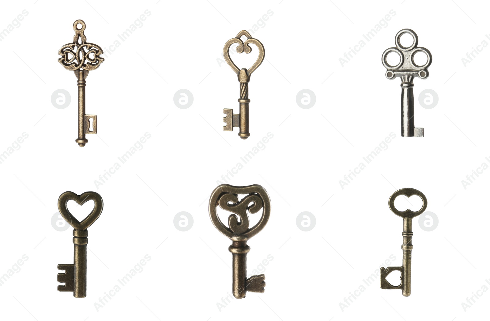 Image of Set of different ornate keys on white background