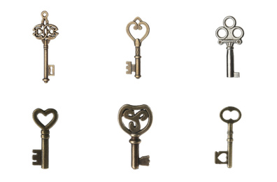 Image of Set of different ornate keys on white background