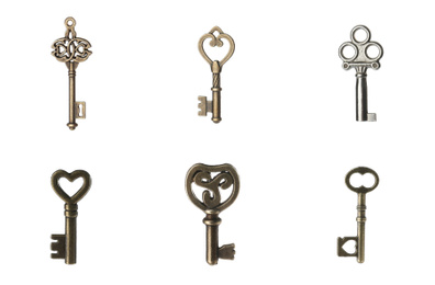 Set of different ornate keys on white background