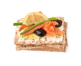 Photo of Fresh crunchy crispbreads with cream cheese, salmon, olives, lemon and green onion on white background, above view