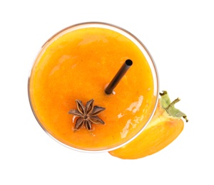 Photo of Tasty persimmon smoothie with anise and fresh fruit isolated on white, top view