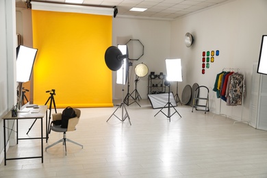 Photo of Interior of modern photo studio with professional equipment