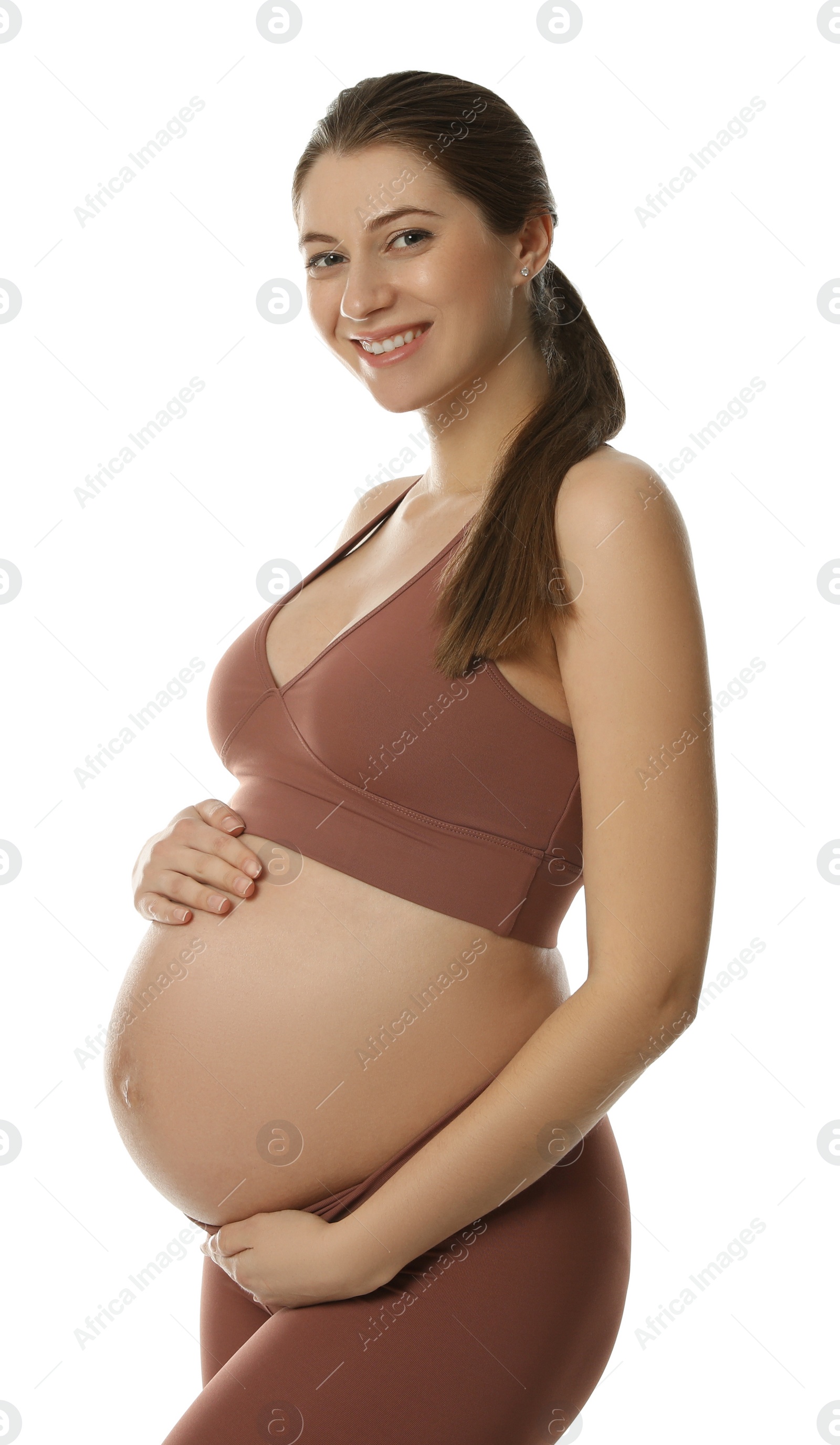 Photo of Happy young pregnant woman on white background