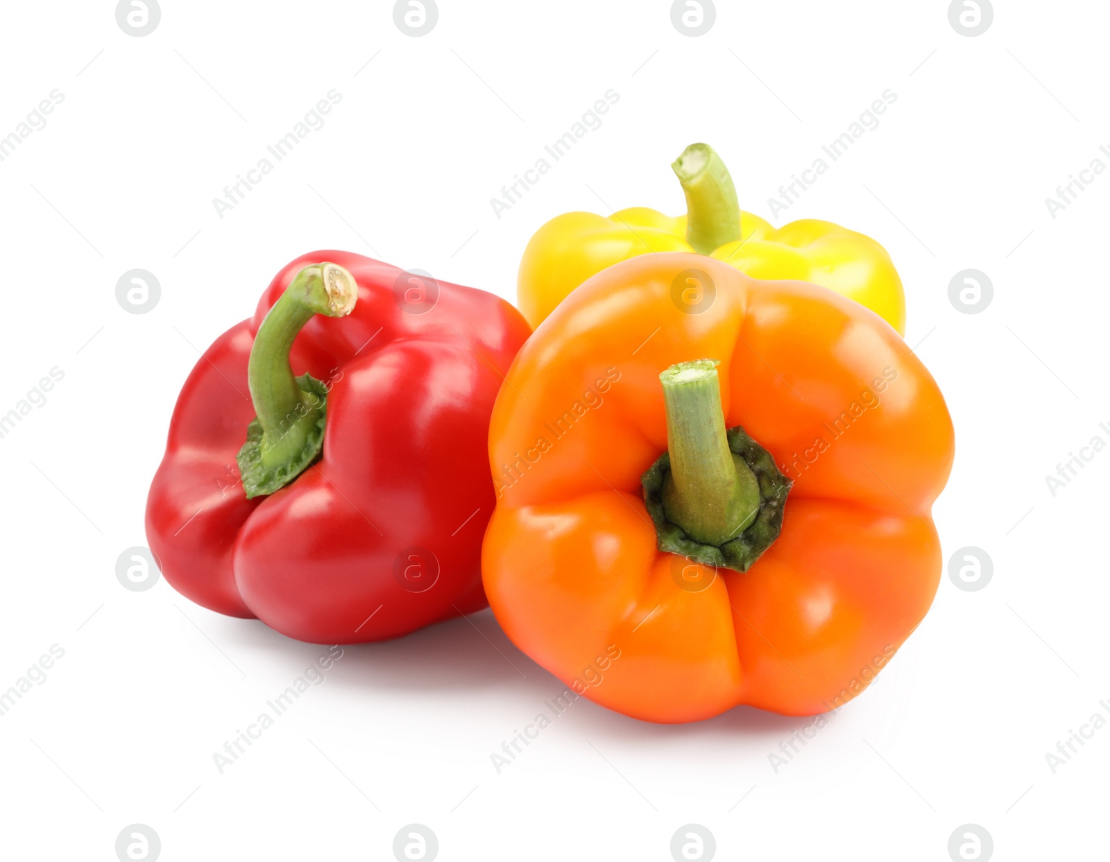 Photo of Fresh ripe bell peppers on white background