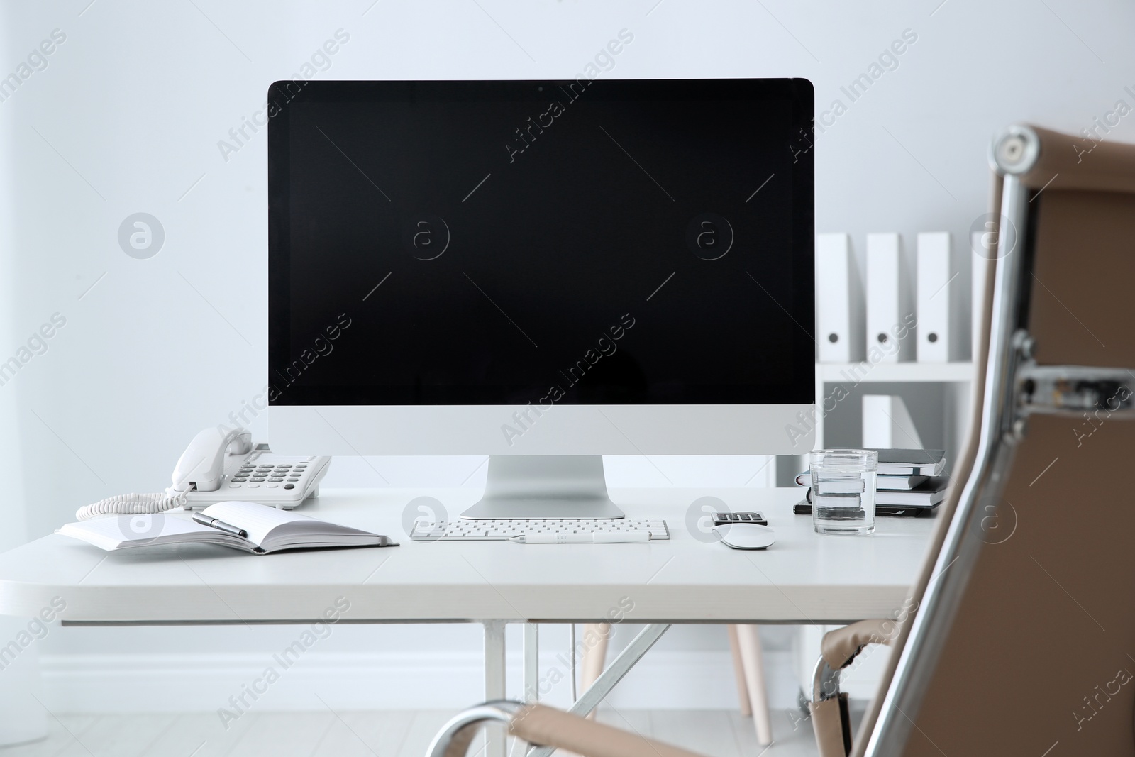 Photo of Stylish workplace with modern computer on desk