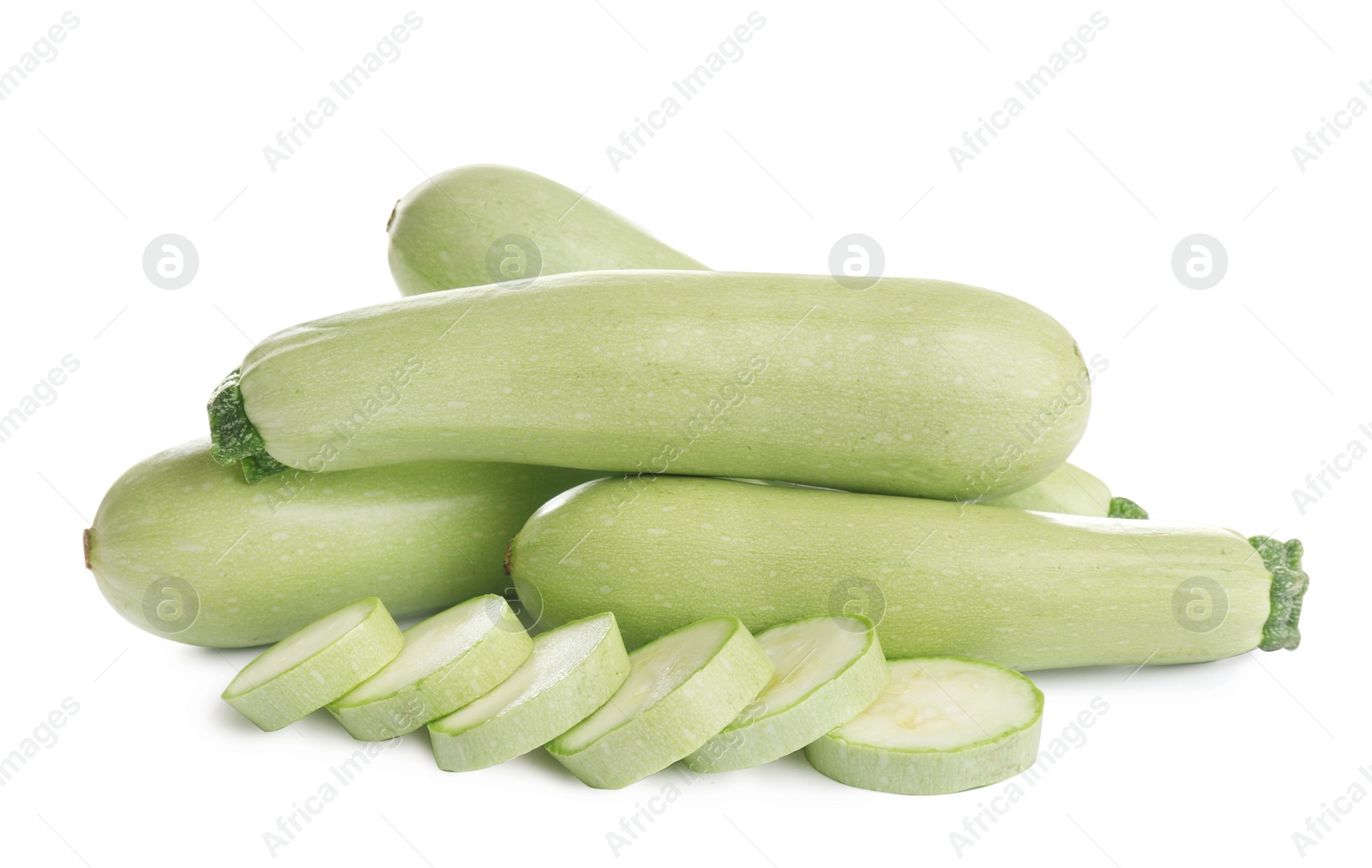 Photo of Fresh ripe green zucchinis isolated on white