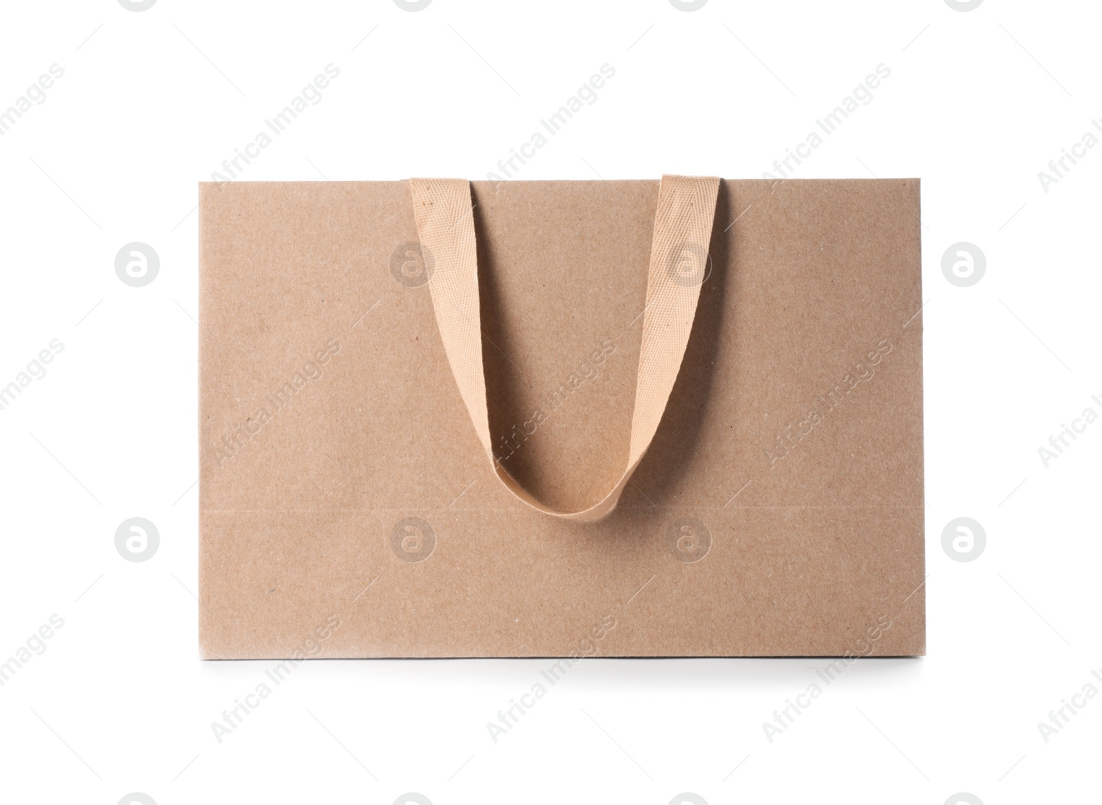 Photo of Paper shopping bag with comfortable handles on white background. Mockup for design