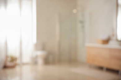 Photo of Blurred view of light modern bathroom interior