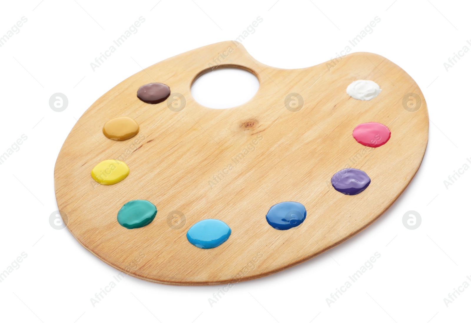 Photo of Palette with paints on white background